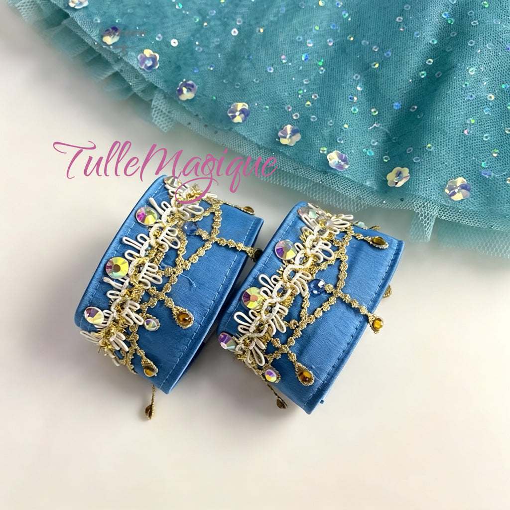 Detailed view of gold embroidery on blue arm bands for the Two-Piece Odalisque and Gamzatti.