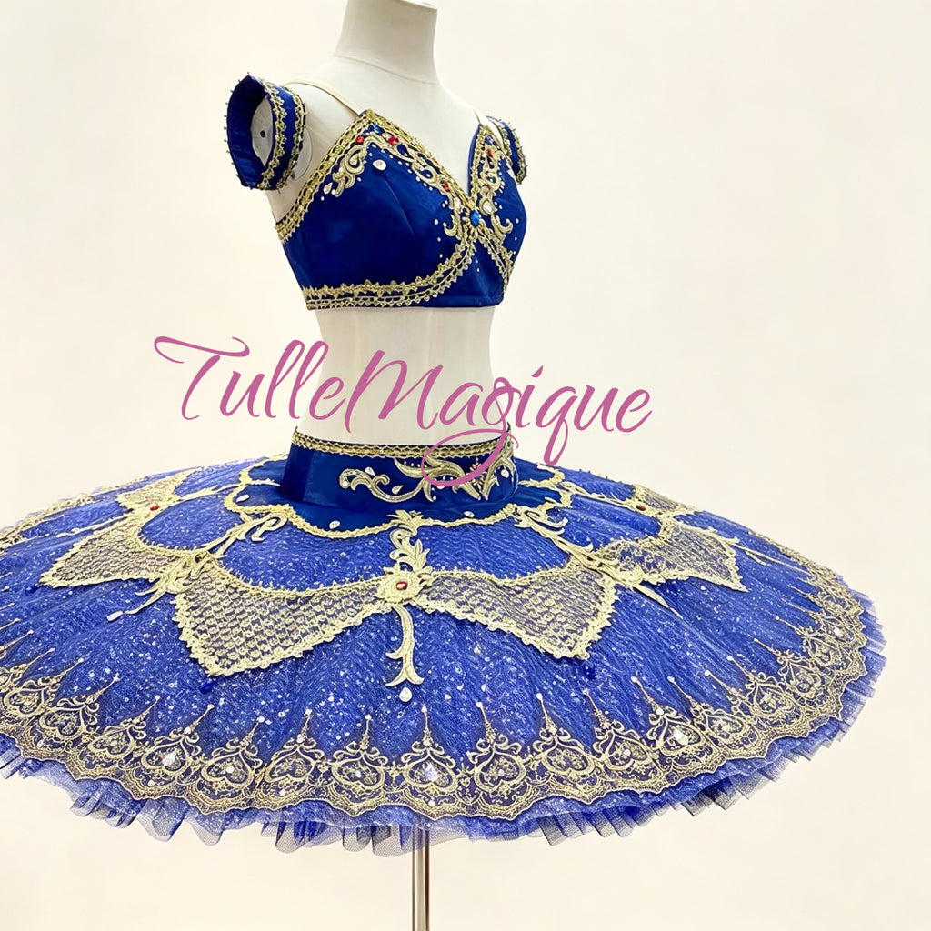 A royal blue tutu costume with gold lace and sequin embellishments. Professional Two-Piece Classical Ballet Tutu Odalisque Gamzatti Variation Competition Costume.