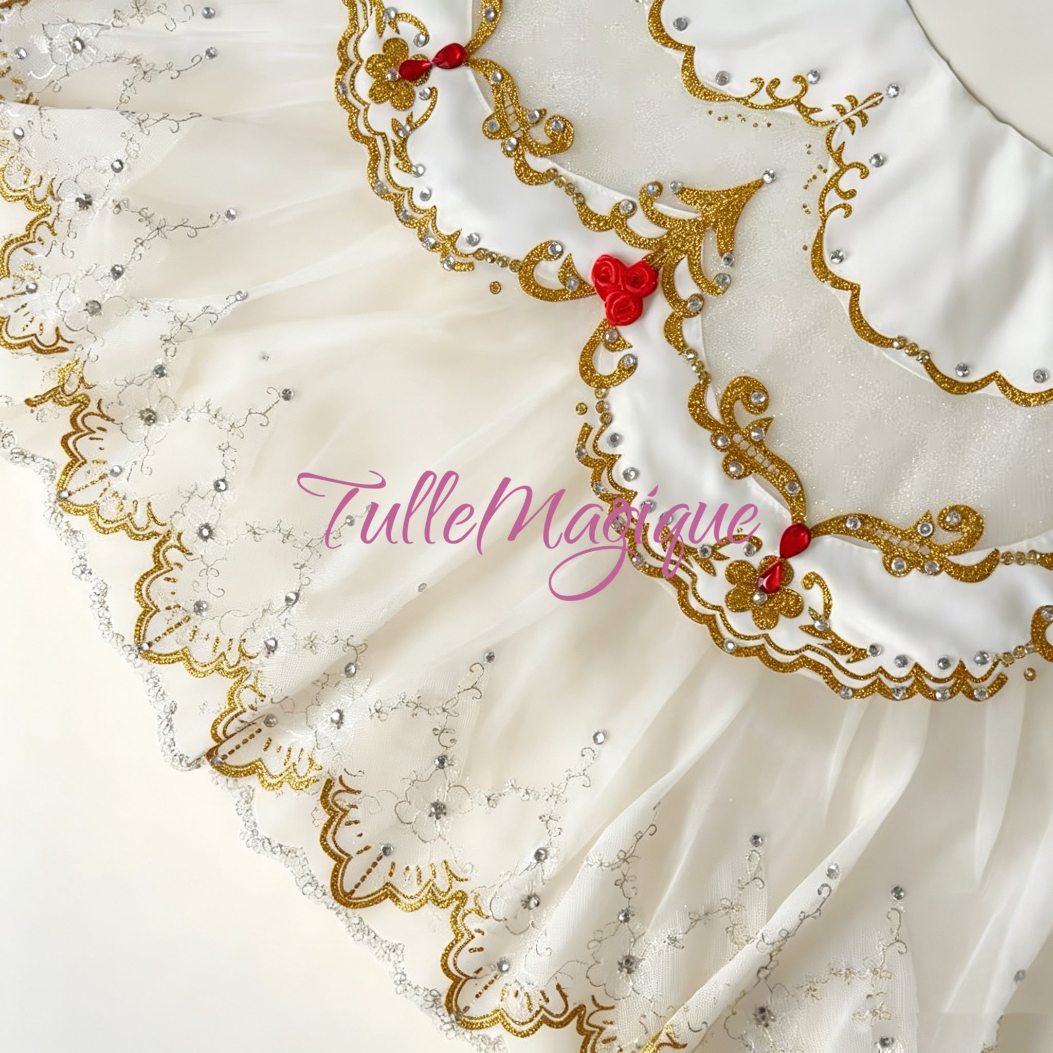 White classical tutu with Gold Scrollwork and red gems  and red rose decoration.