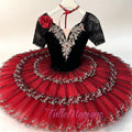 Professional black velvet and red classical ballet tutu for Don Quixote Kitri variation, featuring mesh mid-sleeves, a red rose accent, and a layered red-black platter skirt with gold embroidery for YAGP.