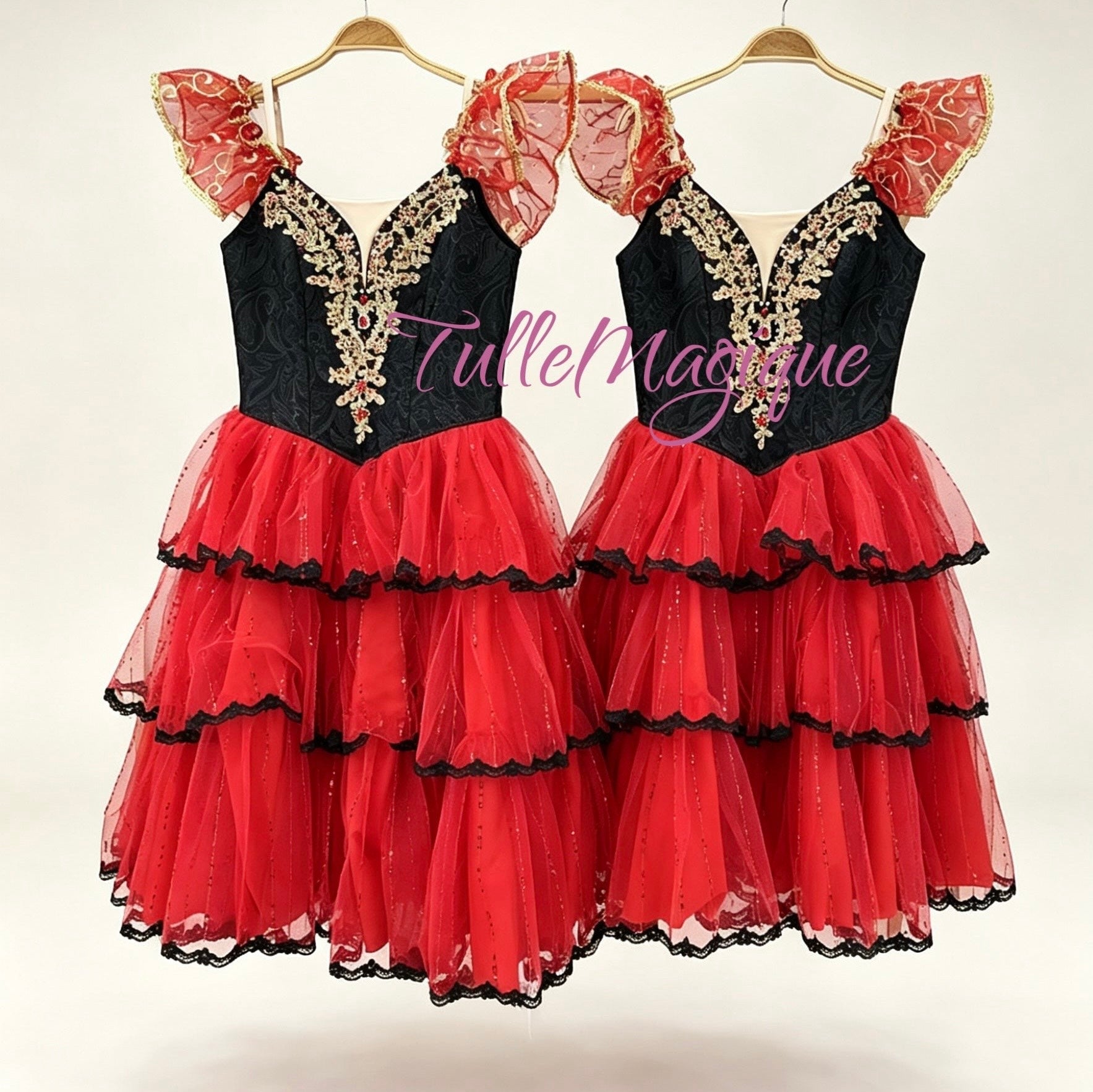 Professional spanish style long romantic tutu for kitri featuring black embodirary bodice with gold appliques and red tulle layered tutu with red shining sequince. 
