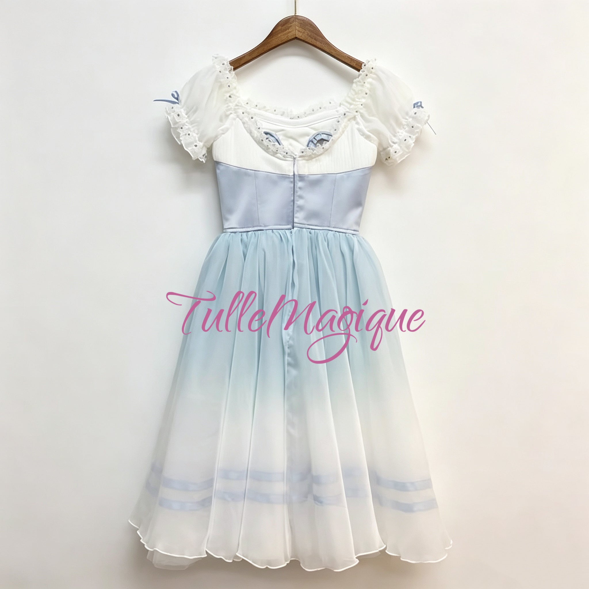 A professional romantic ballet dress with ombre blue flowy long tutu skirt with ribbones and hooks closure on the back. 