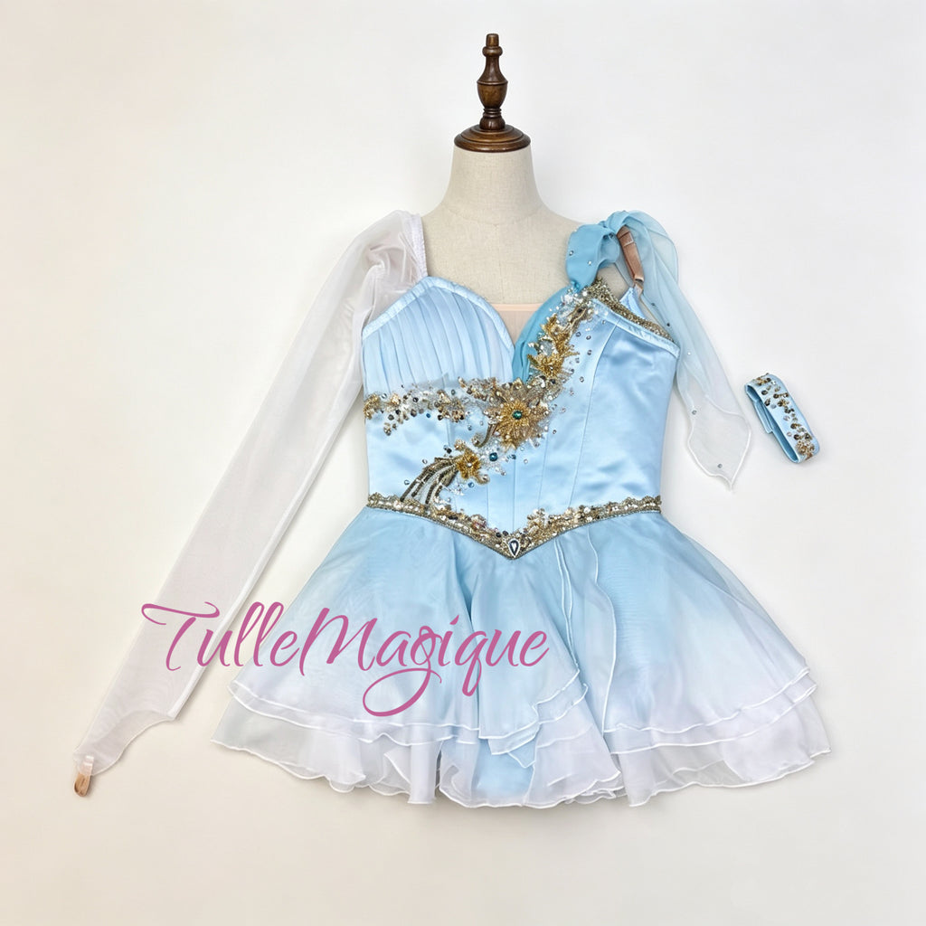 Sky blue professional ballet tunic for Talisman or Pharaoh's Daughter river variation, featuring asymmetric gold embroidery and draped sash by TulleMagique.⁠