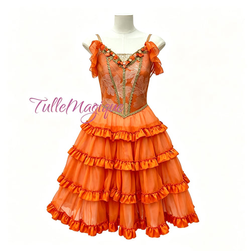 Made-to-measure bright orange Spanish gypsy character ballet dress featuring leaf-patterned bodice and ruffled romantic  tutu skirt.