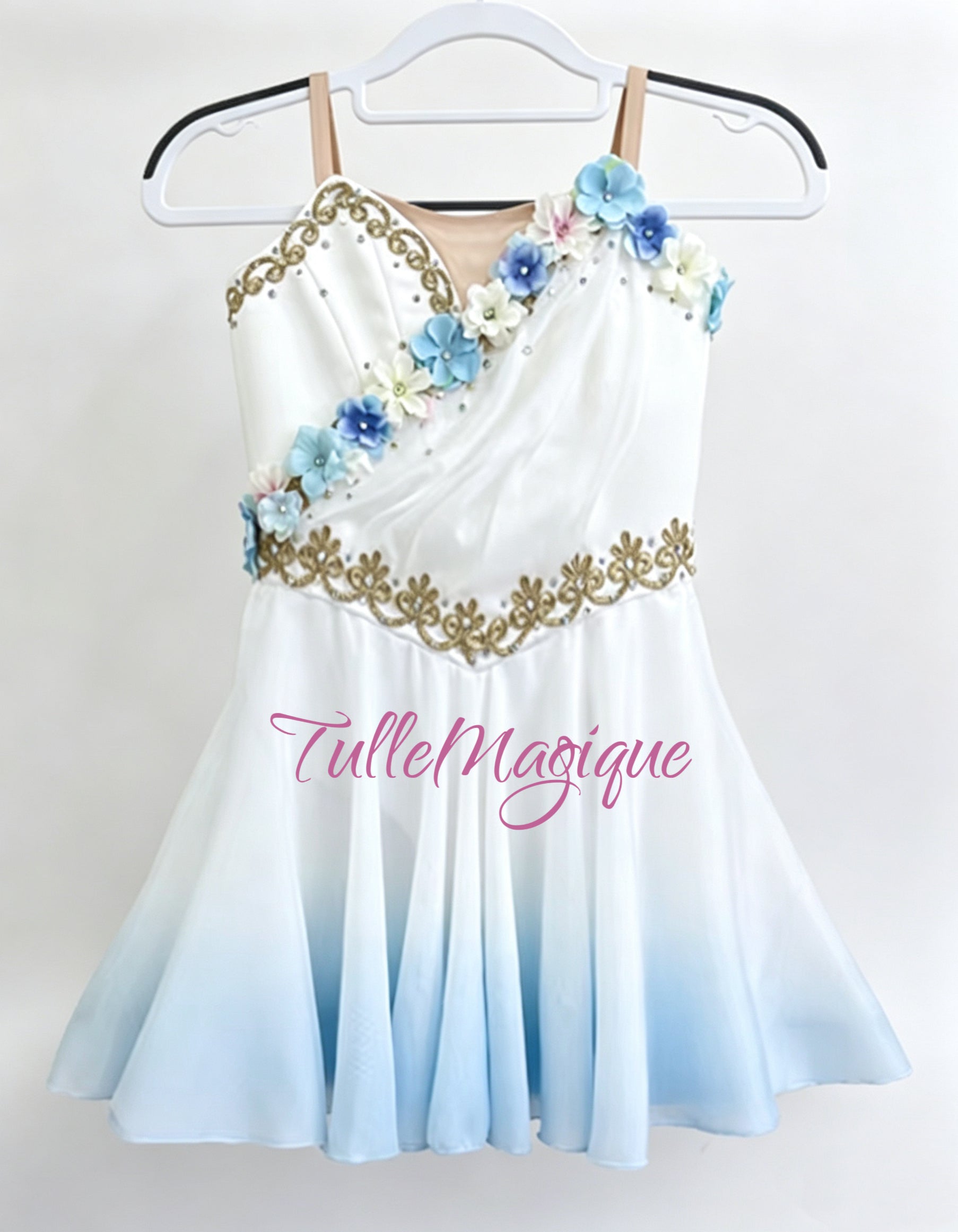 High-quality classical ballet competition solo costume suitable for Cupid or Talisman variations, featuring a beautifully decorated V-neck bodice and lightweight short chiton skirt. White to blue ombré color with 3 D flower decoration.