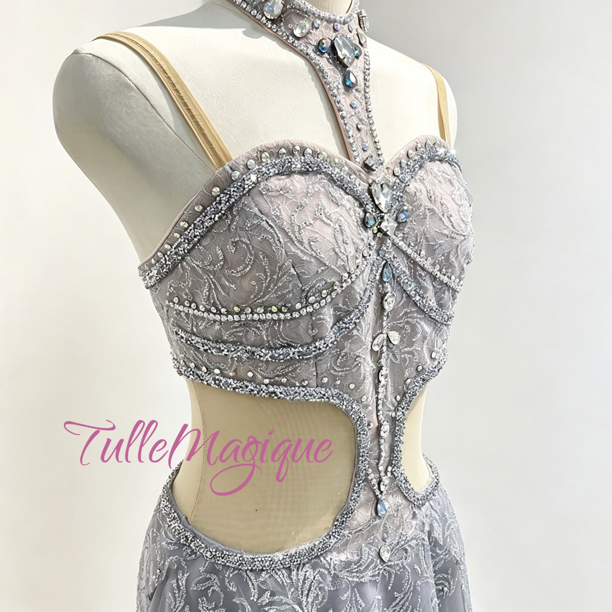 ⁠Close-up of TulleMagique professional ballet bodice featuring heavy silver embroidery, crystals, and matching jeweled halter choker.