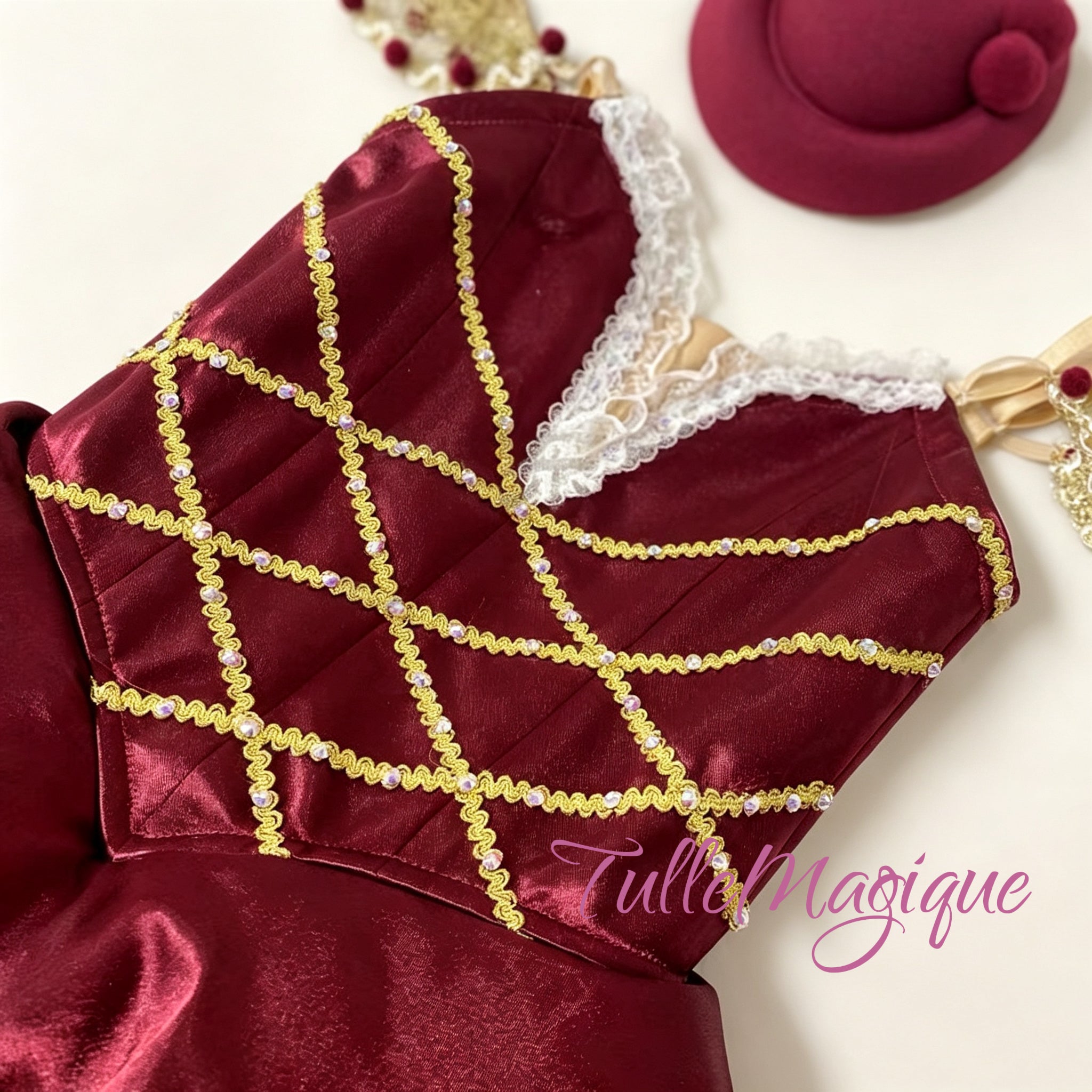 Professional Countess Cherry variation dress from Cipollino featuring gold criss-cross royal braiding