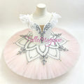 A light pink tutu features a white lace-trimmed bodice with silver embroidered details, a V-neckline, and a voluminous light pink tulle skirt.Professional classical ballet tutu for Crystal Fountain Fairy variation in Sleeping Beauty