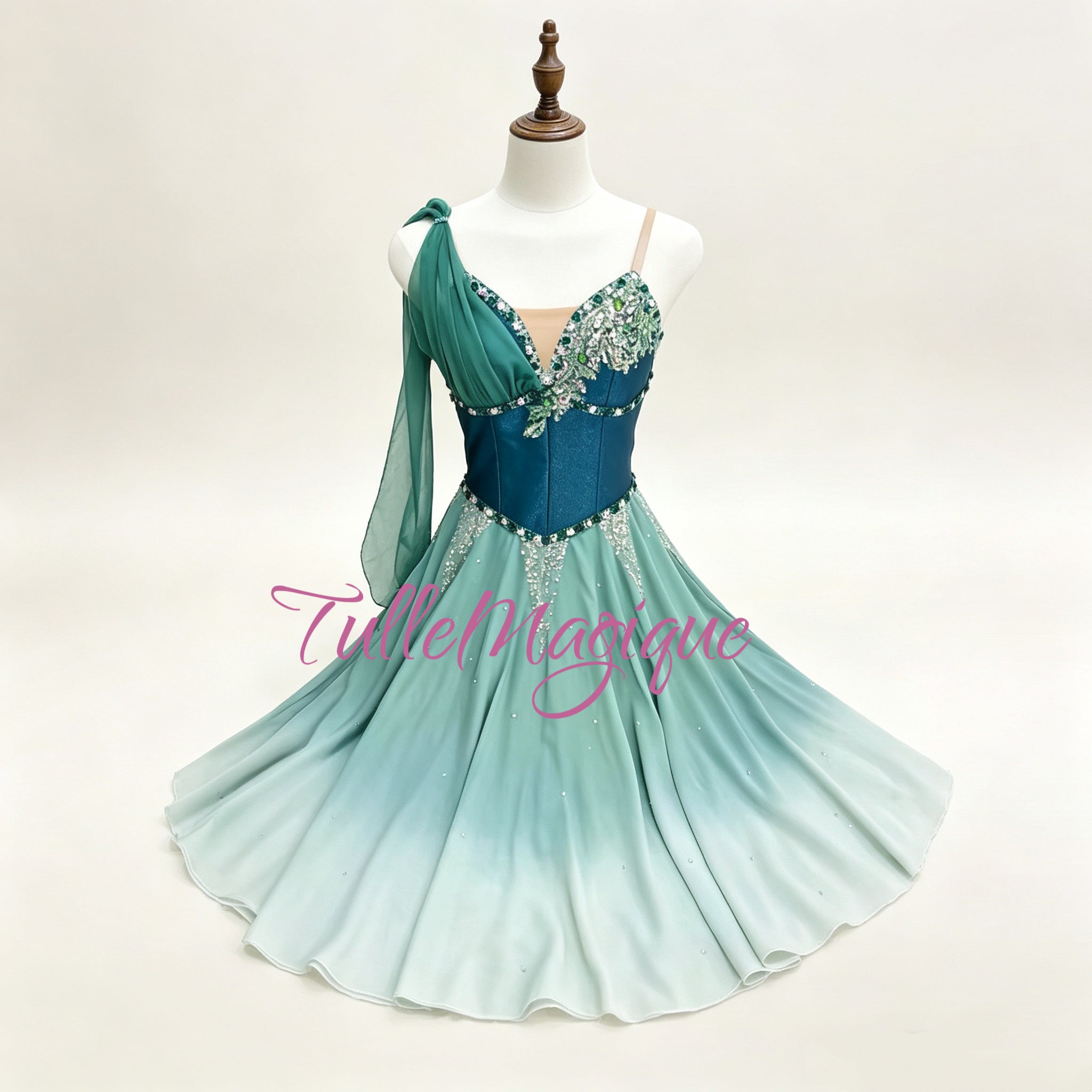 Custom Le Corsaire professional green ombré modern ballet costume with gradient skirt and shoulder drape on a mannequin