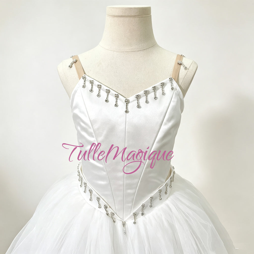 Custom-made white satin romantic tutu with drop crystal embellishments for La Sylphide ballet stage performances.