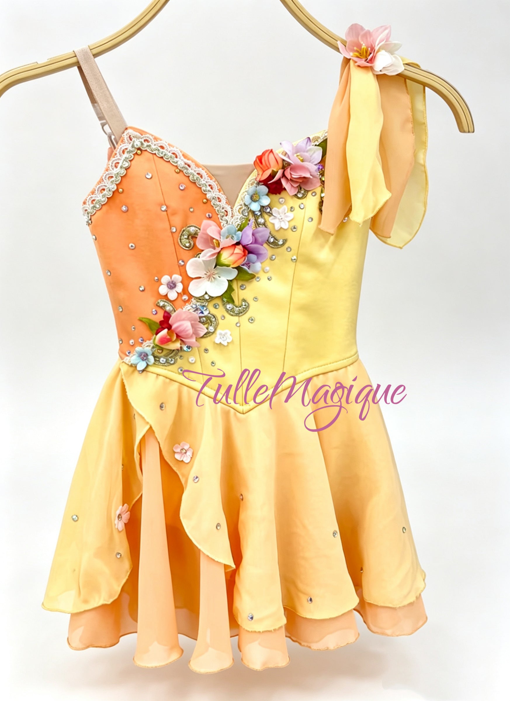 Exquisite Dew Drop fairy ballet tunic costume from image_5.png, showing a warm orange and sunshine yellow gradient dress adorned with delicate floral appliques for the Waltz of the Flowers