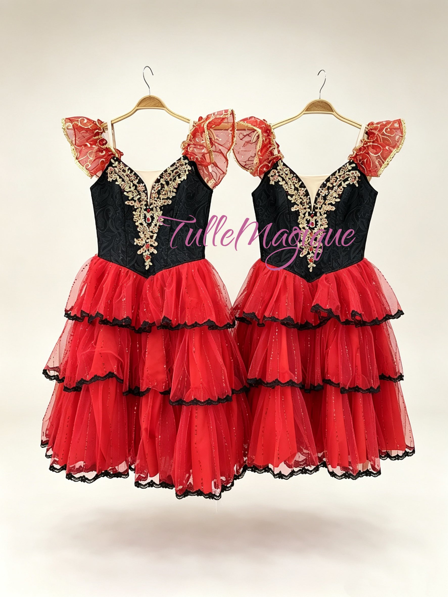 Professional Don Quixote ballet costume for Kitri variation, black bodice with gold appliques and dramatic red and black tiered romantic tutu for YAGP competition.