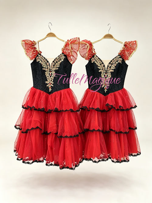 Professional Don Quixote ballet costume for Kitri variation, black bodice with gold appliques and dramatic red and black tiered romantic tutu for YAGP competition.