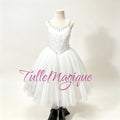 Professional white romantic tutu for Giselle Act 2 and La Sylphide variations, featuring satin bodice with crystal embellishments and tiered tulle skirt by TulleMagique