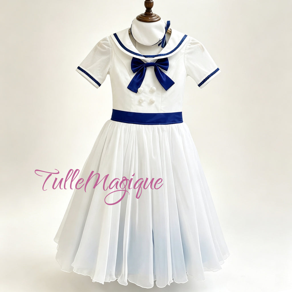 Front view of a professional white and navy blue Graduation Ball ballet costume featuring a sailor collar bodice with double-breasted buttons, a blue ombre romantic tulle skirt, and a matching sailor hat accessory.