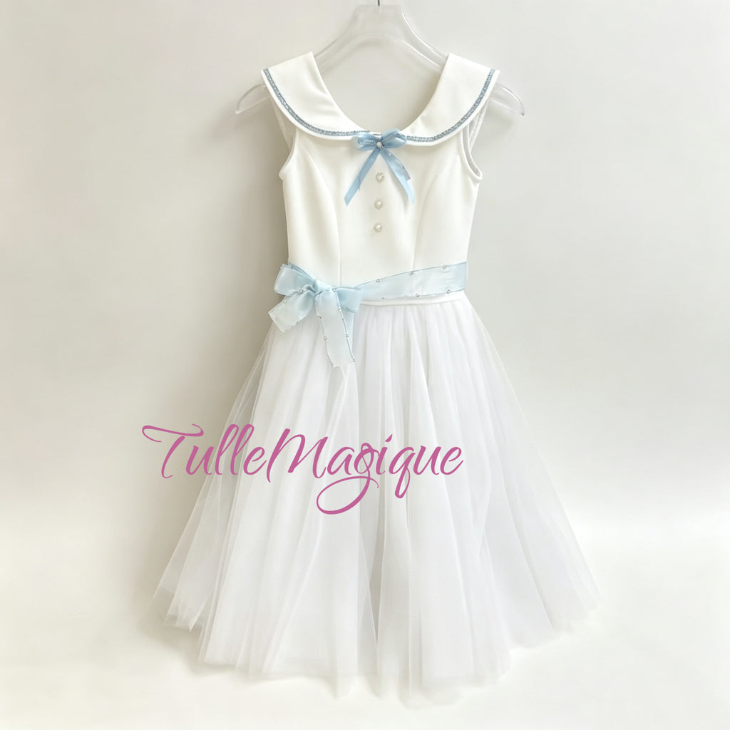 Front full view of a professional white and light blue romantic ballet dress for Graduation Ball ballet repertoire featuring a sleeveless schoolgirl bodice with a sailor collar and a white tulle skirt