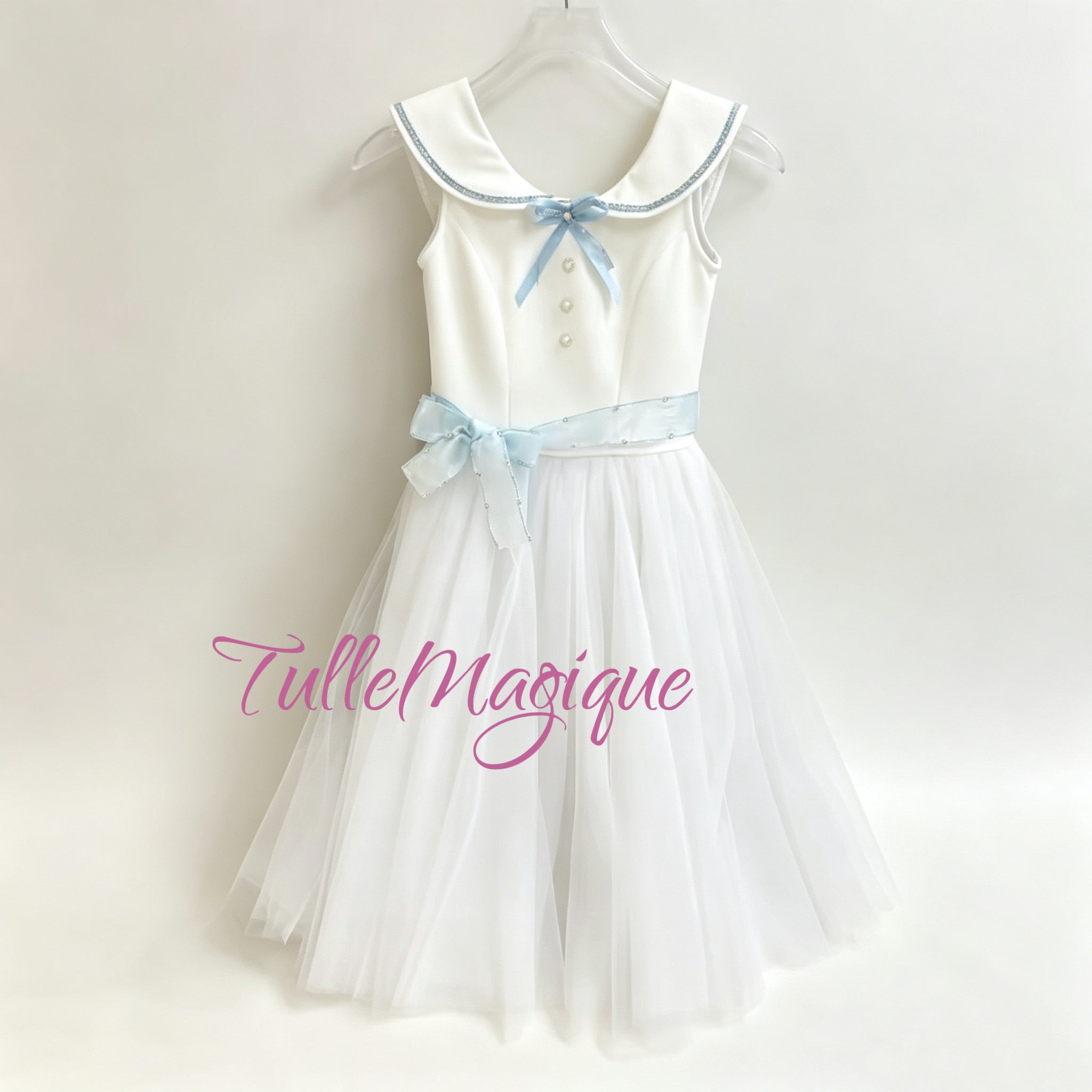 Front full view of a professional white and light blue romantic ballet dress for Graduation Ball ballet repertoire featuring a sleeveless schoolgirl bodice with a sailor collar and a white tulle skirt