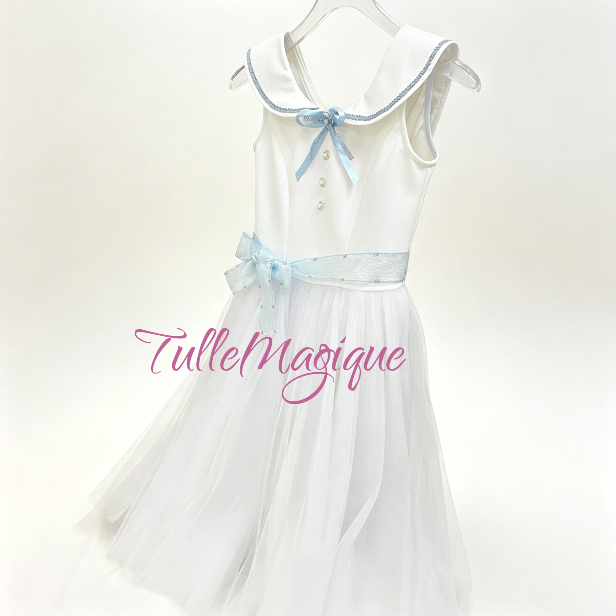 Detailed view of the sparkling light blue organza waist sash on the Graduation Ball ballet dress tied in a side bow with subtle micro-rhinestone details