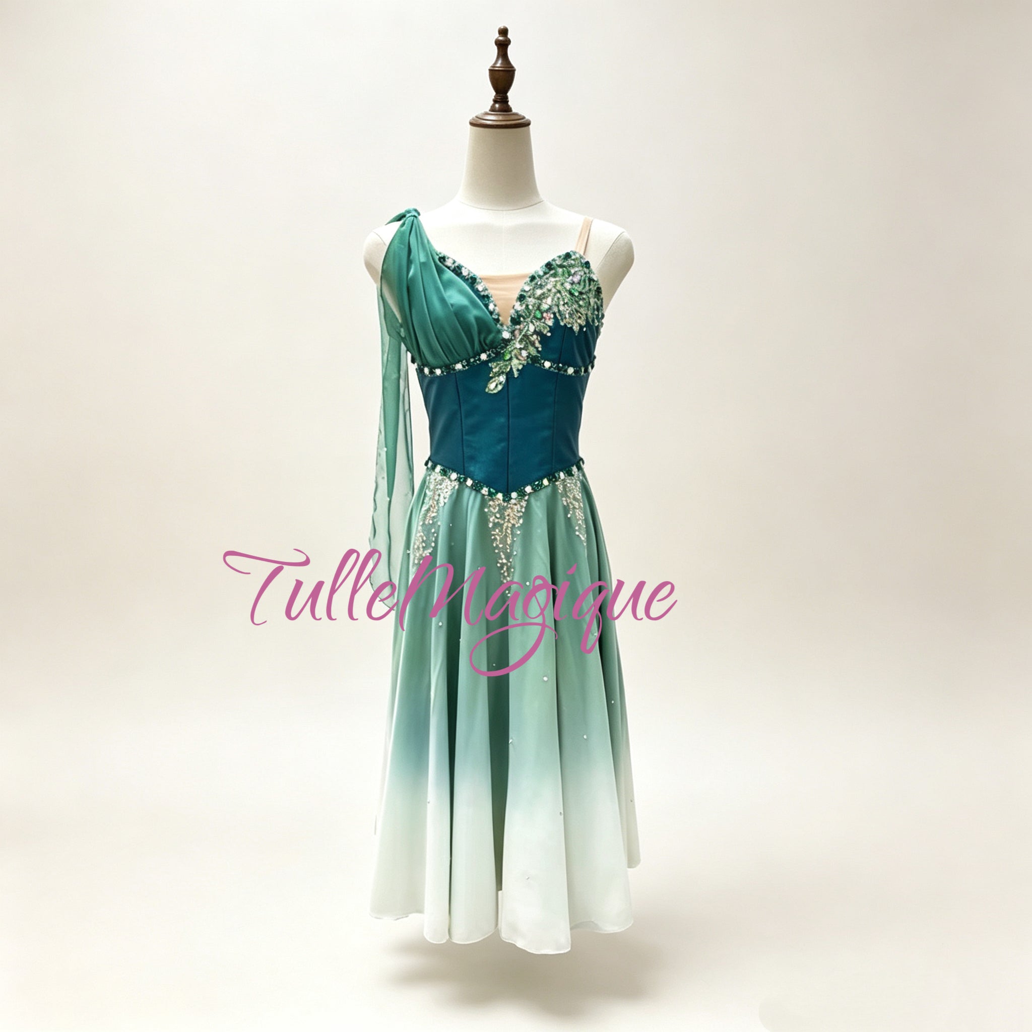 Detail of the gradient skirt flowing gracefully from deep teal to pale mint white for Le Corsaire variations