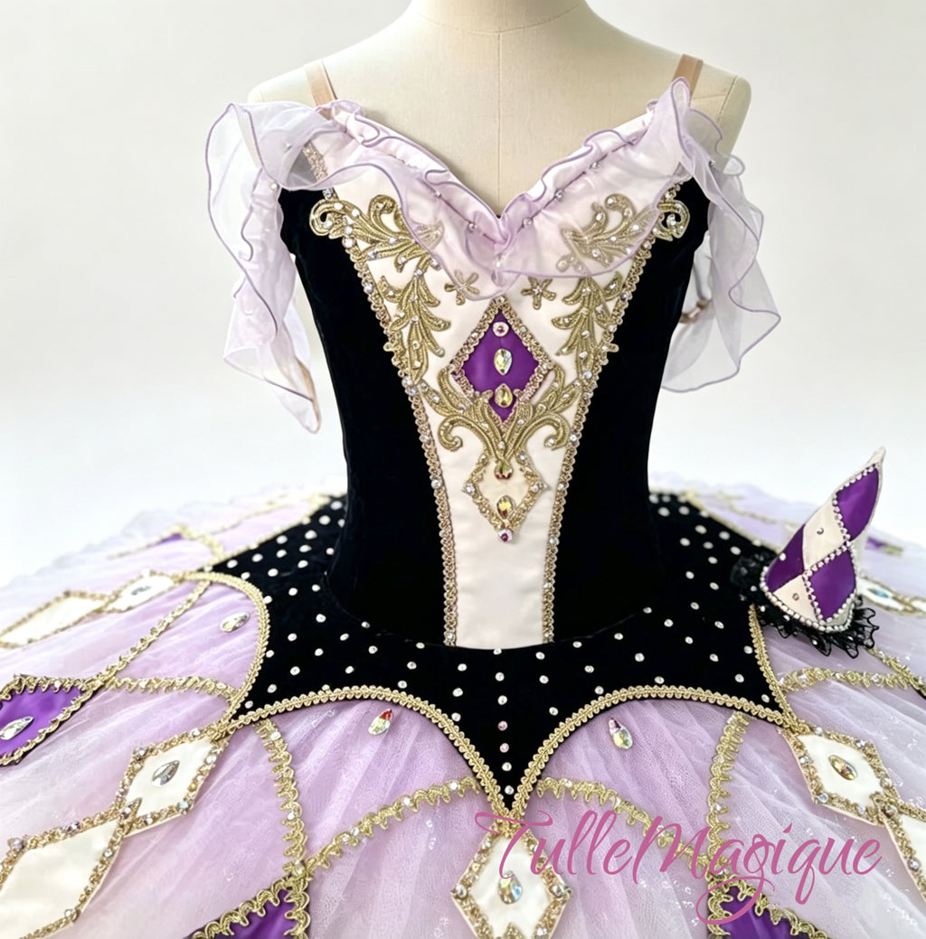 Handcrafted lavender and black professional ballet competition tutu for Harlequinade or Fairy Doll variations, adorned with gold baroque embroidery, shimmering rhinestones, and hanging crystal droplets.