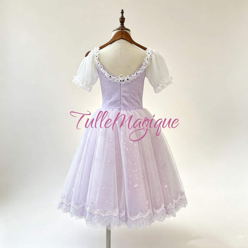 Back view of the lilac peasant ballet costume showcasing the professional multi-row adjustable hooks and eyes closure, secure inner bodice structuring, and flowing romantic tulle