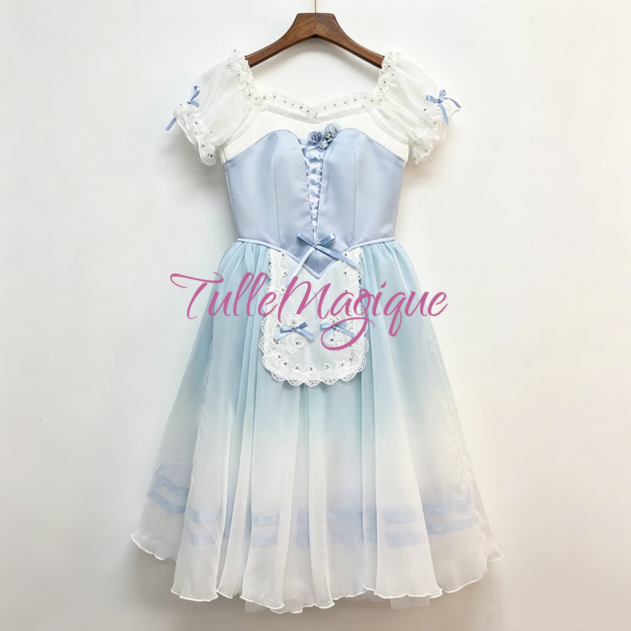 Professional giselle Swanhilda peasant ballet costume featuring a light blue satin bodice with criss-cross ribbons and a stunning blue-to-white ombre romantic tutu skirt.
