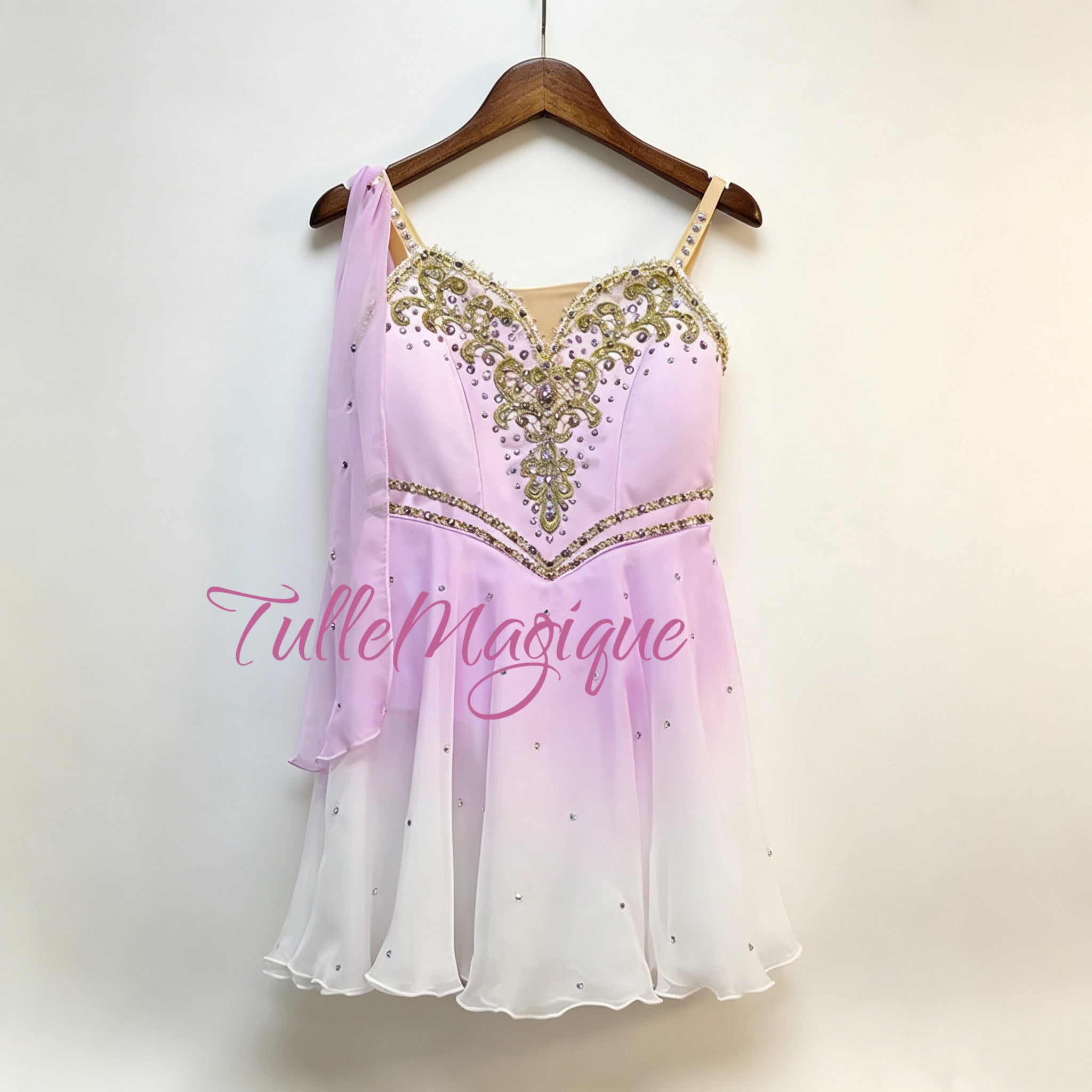 Professional lilac-purple Talisman ballet variation costume, featuring a lavender-to-white ombre chiffon skirt, heavy gold baroque embroidery, and a flowing shoulder drape