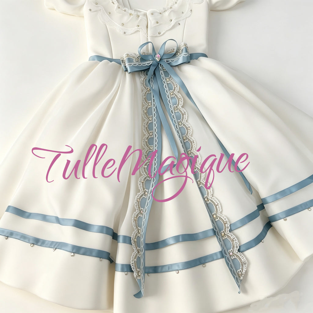 a luxury white and steel blue Graduation Ball ballet costume featuring a heavy lace belt bow at the back.