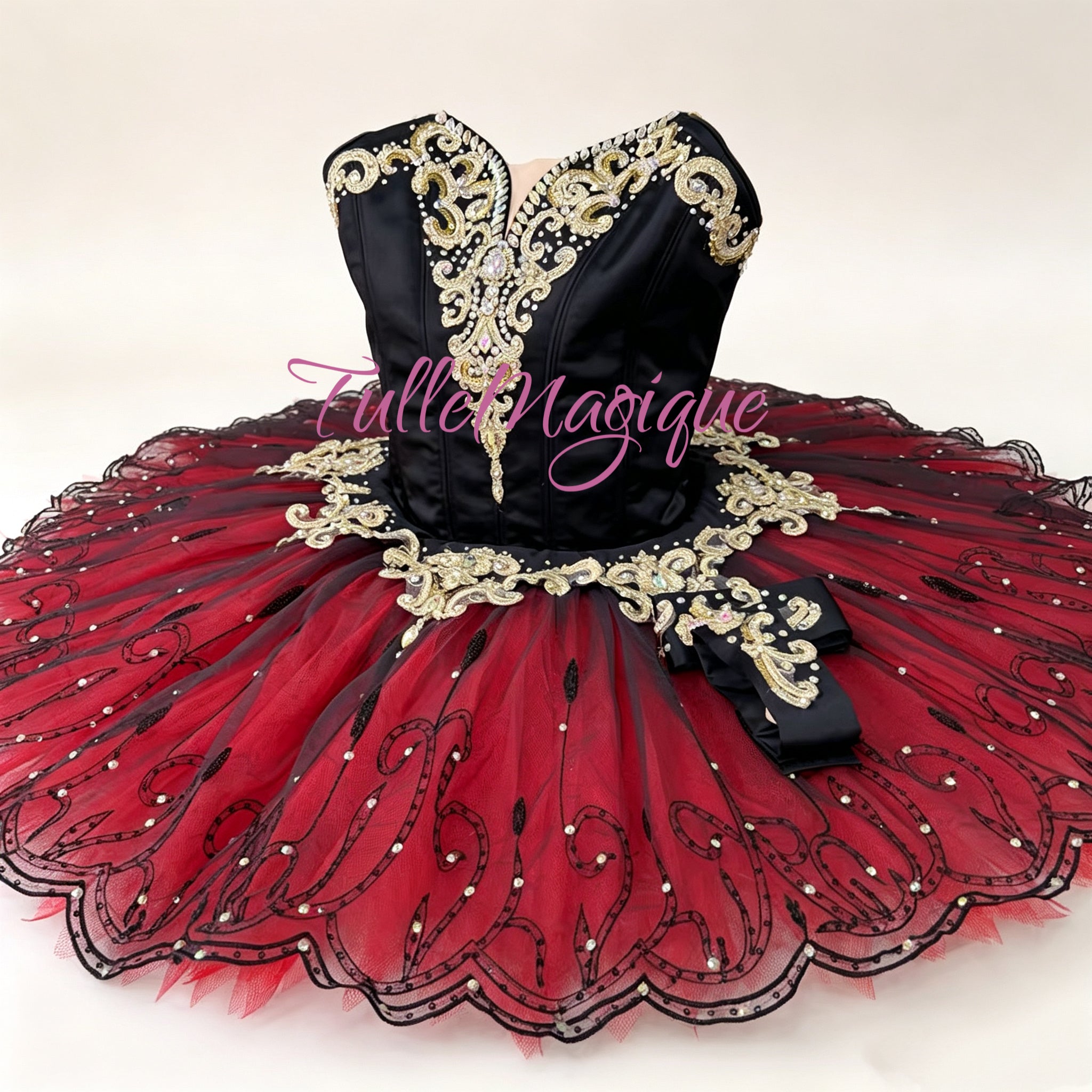 competition-tutu.jpg	Luxury dark red and black stage costume with gold embroidery for ballet competitions.