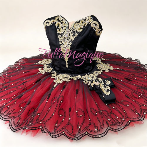 competition-tutu.jpg	Luxury dark red and black stage costume with gold embroidery for ballet competitions.