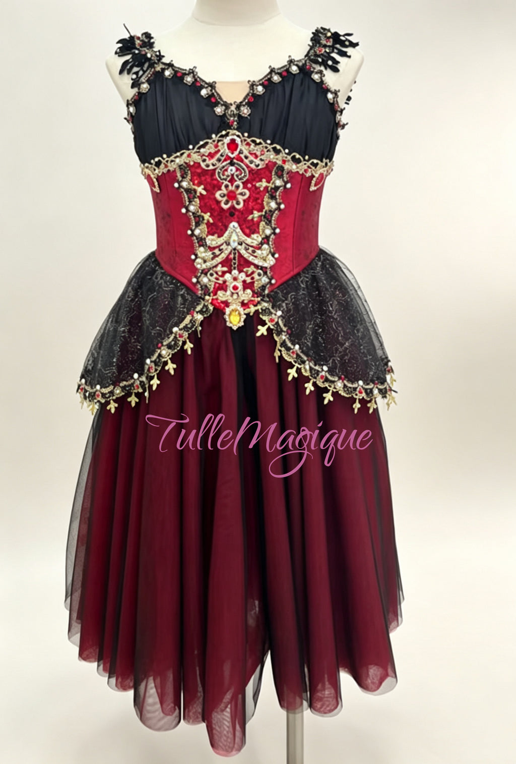Made-to-measure professional gypsy tambourine dance costume with opulent gold embroidery, dangling ornaments, and custom arm bands.