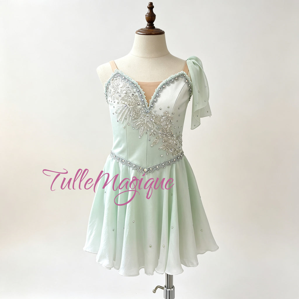 Professional mint green Water Spring ballet variation costume, featuring an asymmetric silver wave-like embroidery with crystals and a flowy layered chiffon skirt