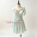 Professional mint green Water Spring ballet variation costume, featuring an asymmetric silver wave-like embroidery with crystals and a flowy layered chiffon skirt