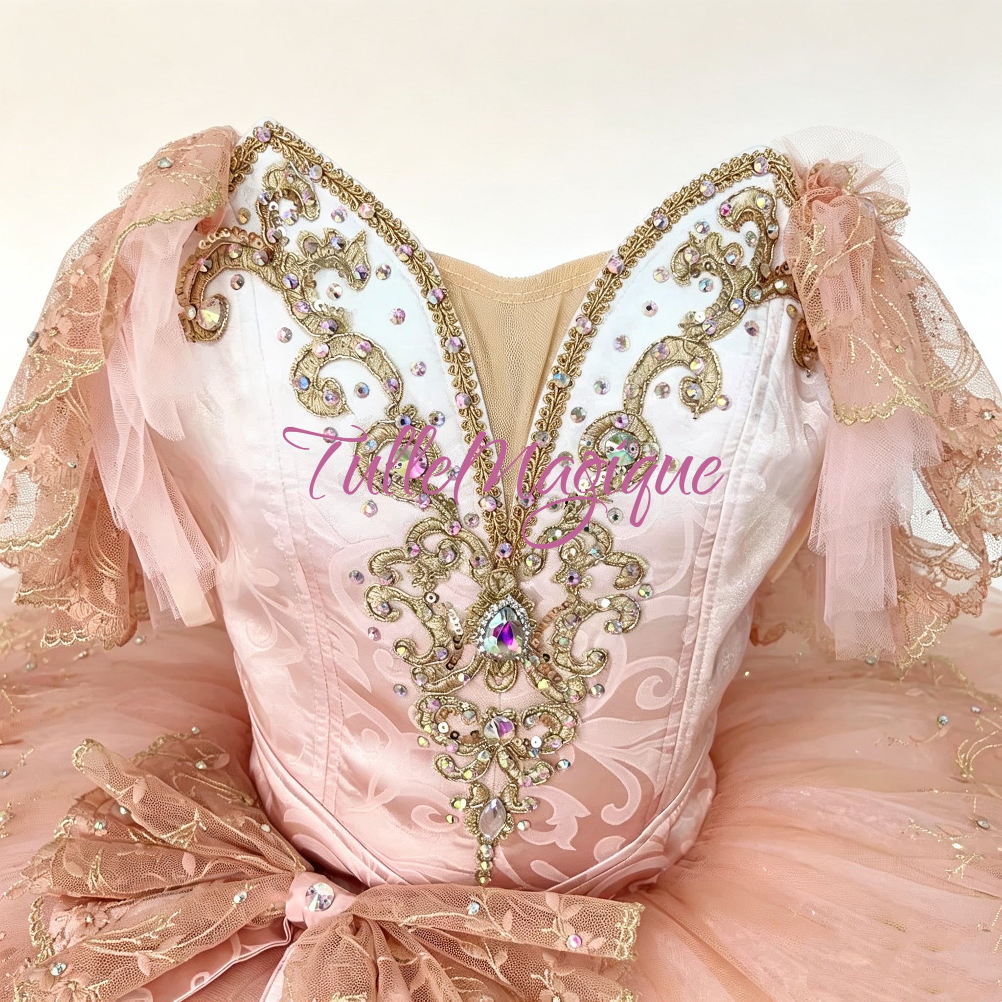 Handcrafted peach pink professional ballet stage costume for Sugar Plum Fairy or Paquita variations, adorned with a luxury lace waist bow, gold trims, and scattered sparkling crystals.