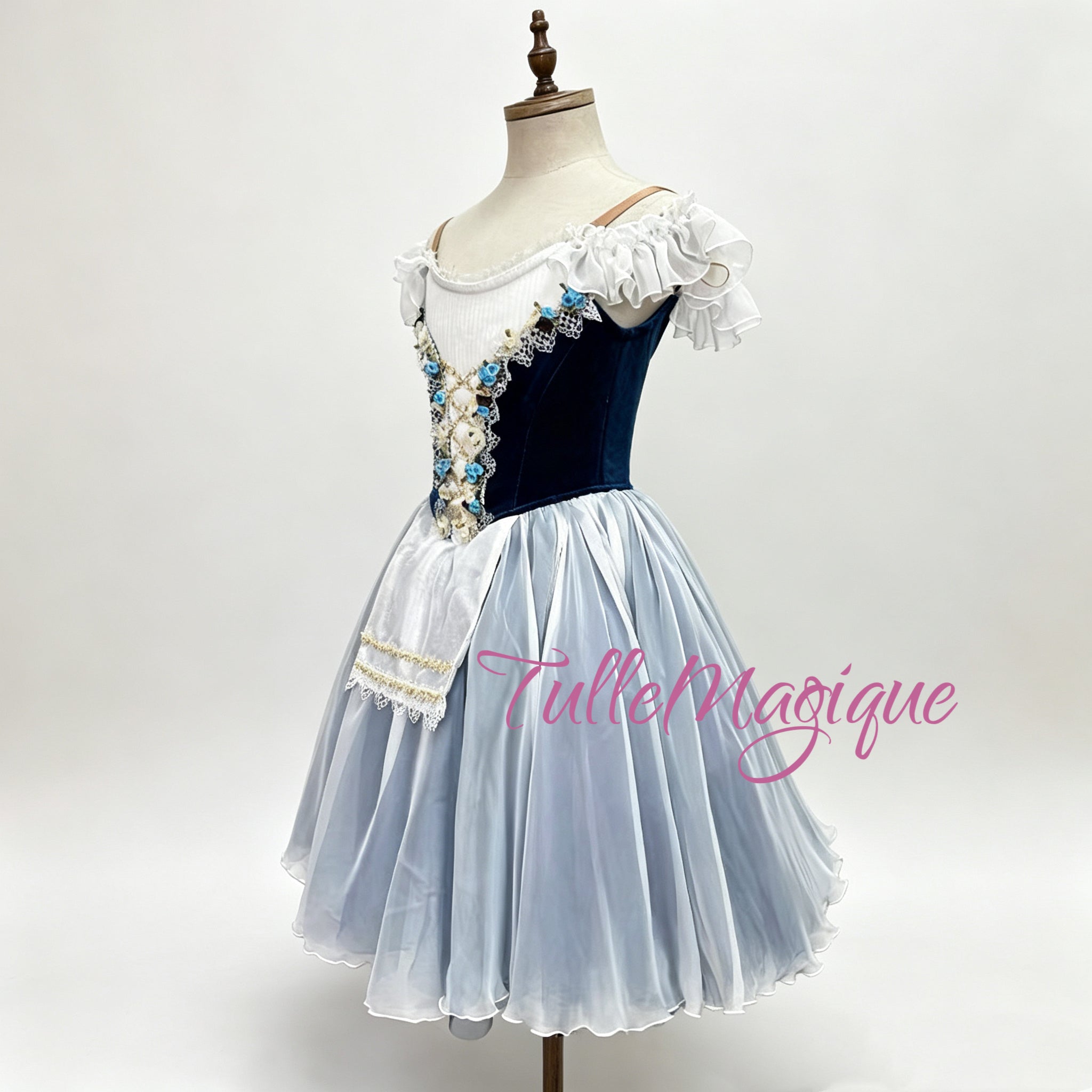 Peasant style ballet dress with a blue corset and white and blue romantic tulle skirt, perfect for Swanhilda or Coppelia variations in YAGP competitions.
