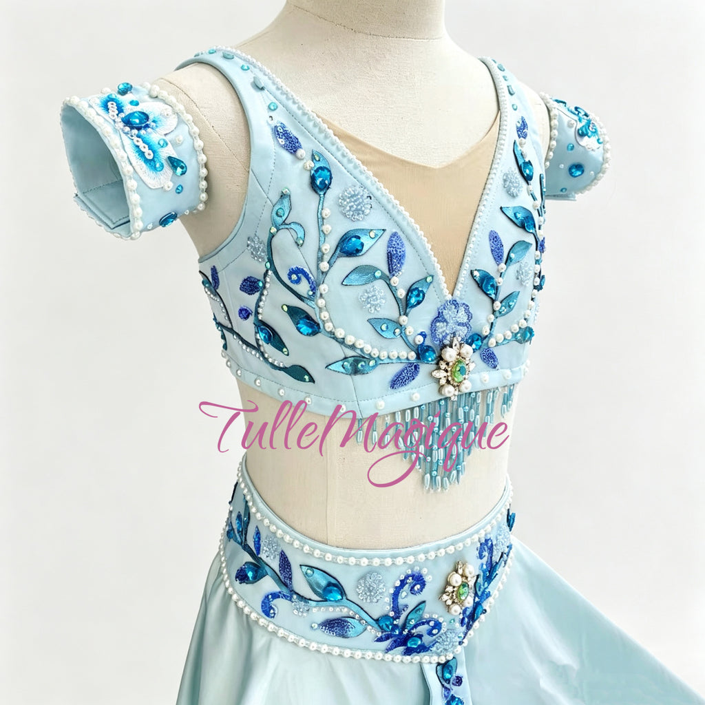 ⁠Two-piece professional ballet gown in light aqua blue, decorated with navy crystals and pearls, perfect for Pharaoh's Daughter or Le Corsaire⁠