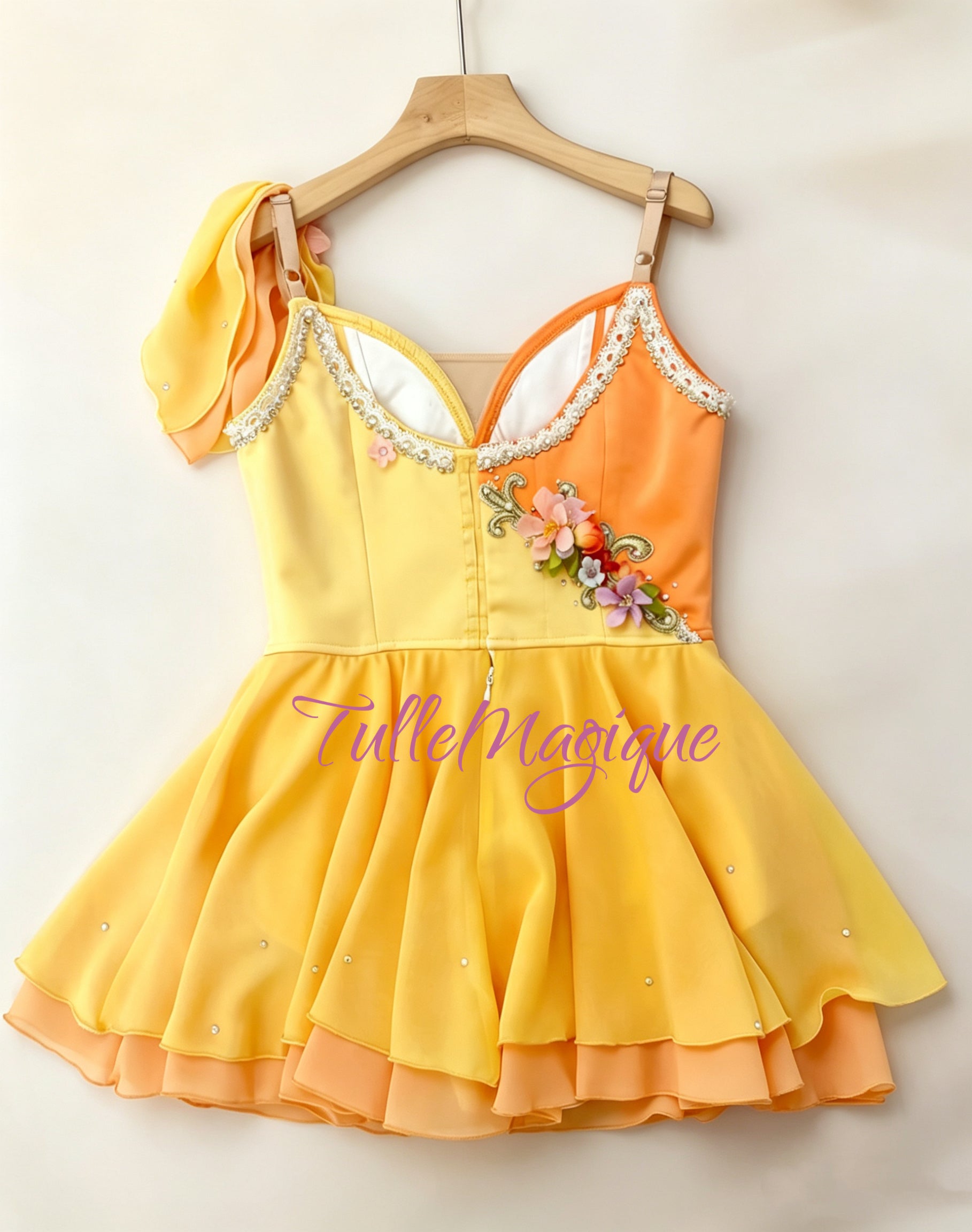 High-end custom made-to-measure professional ballet competition solo wear, featuring an embellished sweetheart neckline with crystals, delicate fabric flowers, and a dynamic lightweight skirt