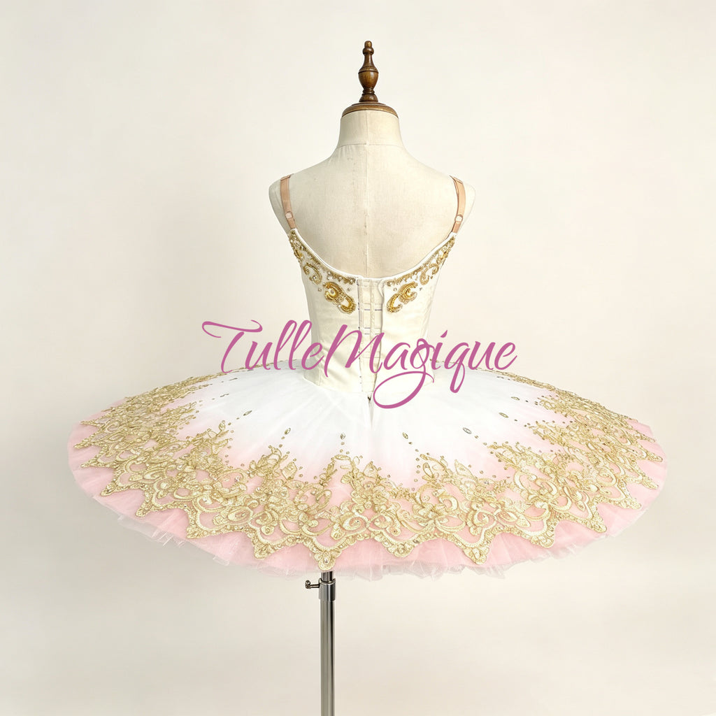 Professional classical ballet tutu in white and soft pink ombré with heavy gold embroidery and crystals, custom stage wear.