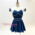 professional lyrical stage wear in midnight blue, detailed with shimmering rhinestone wave patterns on a custom mannequin.⁠