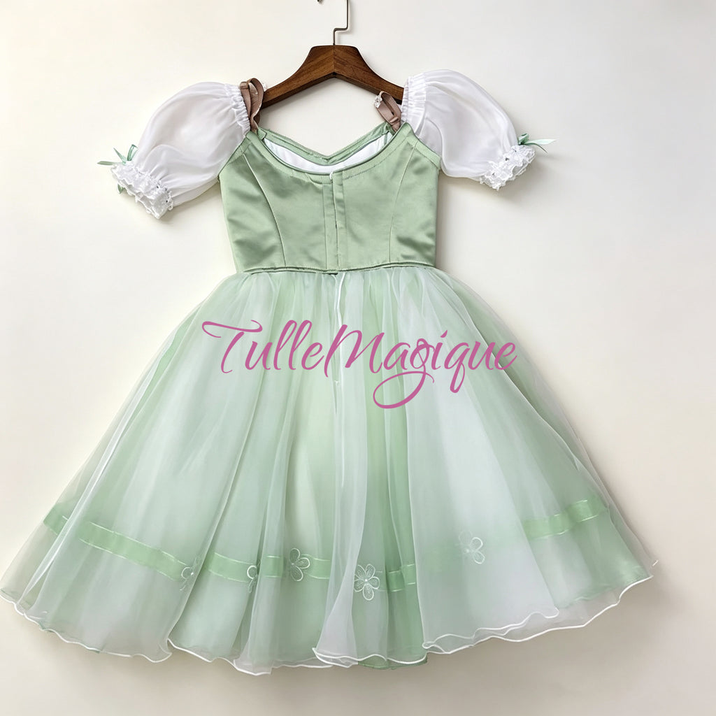 Light green ballet romantic tutu dress with white sleeves and hook-and-eye closure on the back for YAGP competition