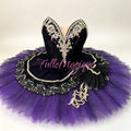 Luxury classical ballet tutu for the Carnival of Venice (Satanella) variation, featuring a dramatic black lace bodice with gold Baroque details and a brilliant violet pancake skirt for international competitions.