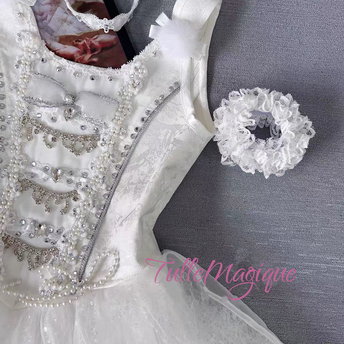 White professional ballet costume with plush pom-poms and silver rhinestone tassels, optimized for the Bunny Drummer variation in The Fairy Doll