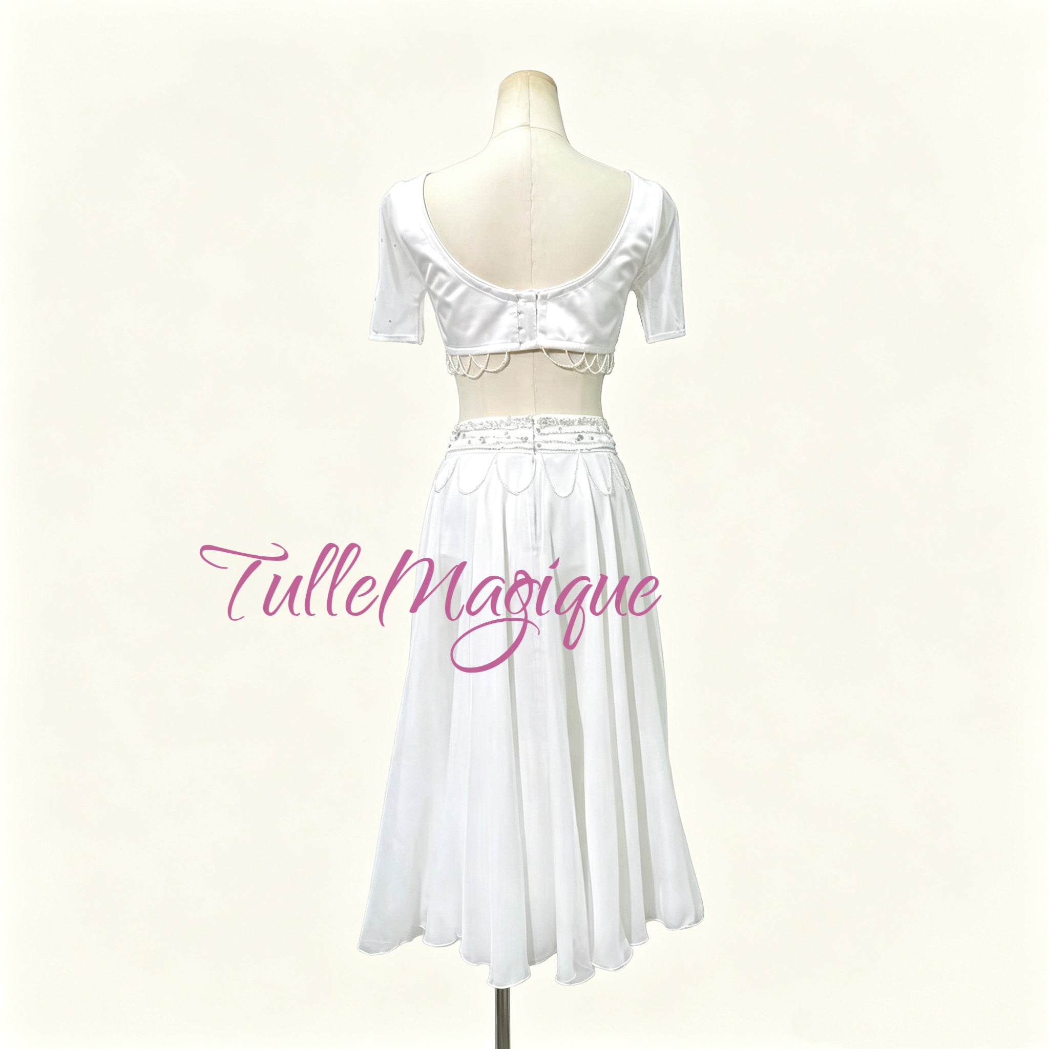 ⁠Back view of TulleMagique professional two-piece white ballet tunic dress with chiffon skirt for stage competition.⁠